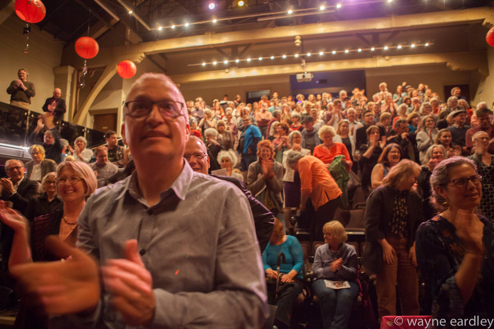 An audience applauds. Photo credit to Wayne Eardley