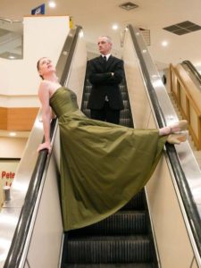 photo of Kate Story and Ryan Kerr on an escalator in Peterborough Sqaure