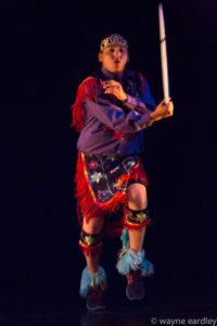 Photo of Nimkii Osawamick dancing