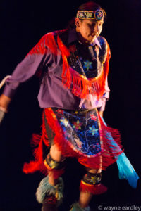 Photo of Nimkii Osawamick dancing